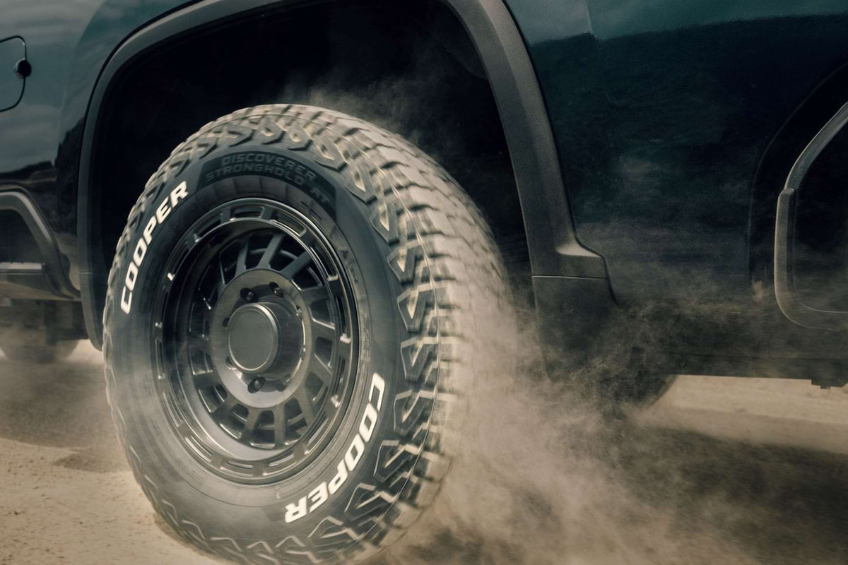 Cooper Discoverer Stronghold A/T — hero dust
