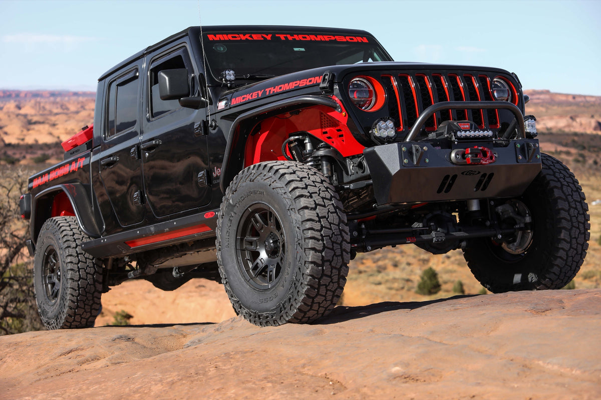 Mickey Thompson Baja Boss A/T — hero gladiator slickrock