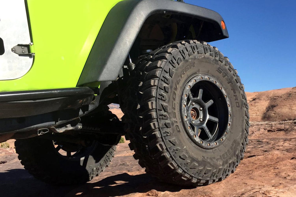 Cooper Discoverer STT Pro — hero jeep slickrock
