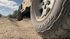General Grabber A/T X — hero sand action