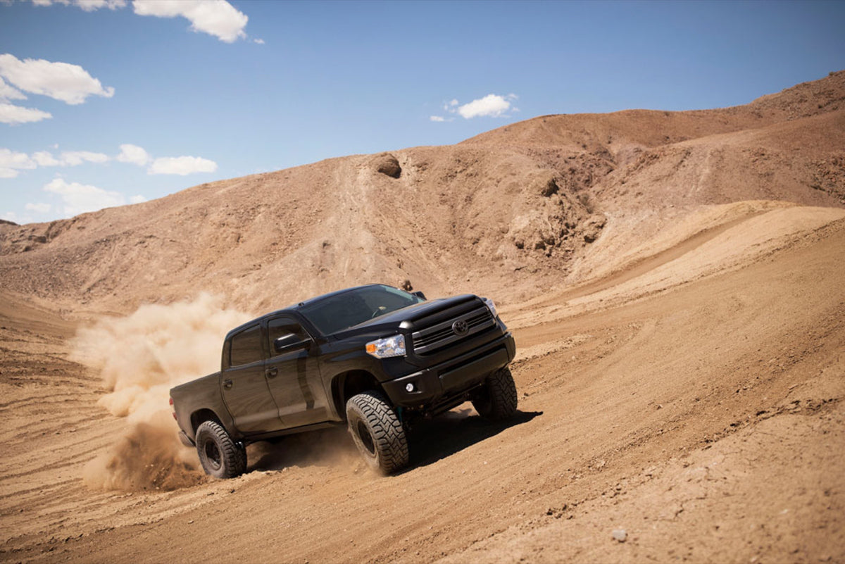 Toyo Open Country R/T — hero action desert