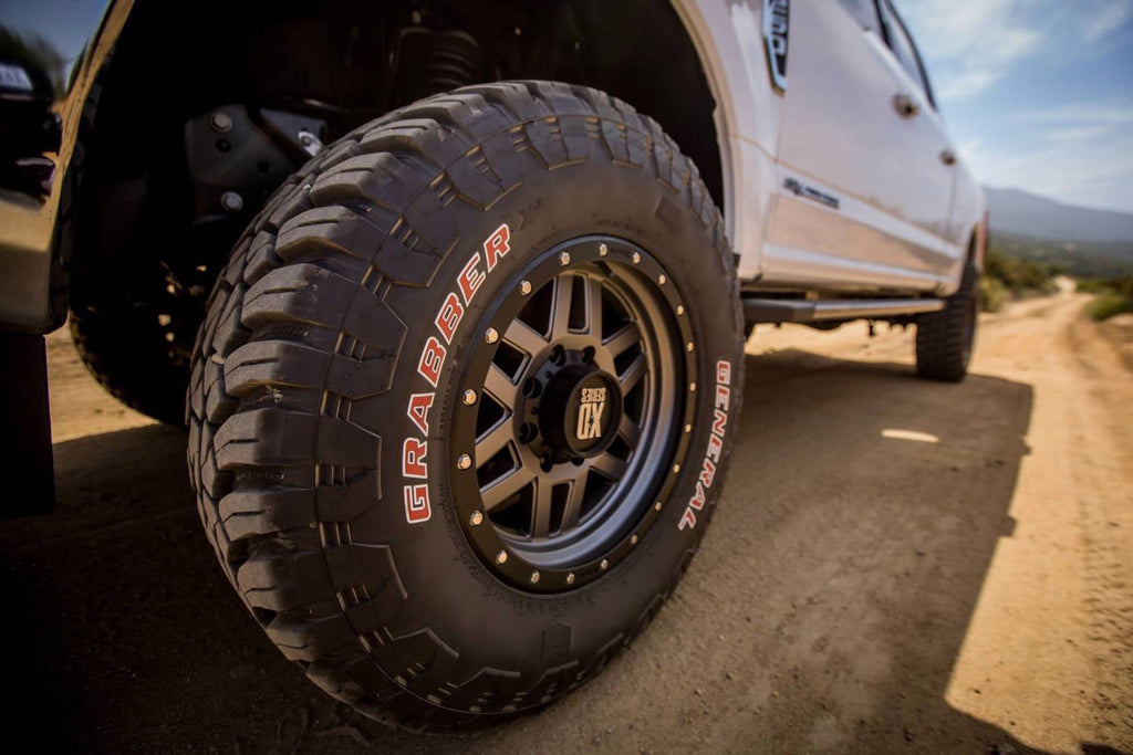 General Grabber X3 — hero truck dirt