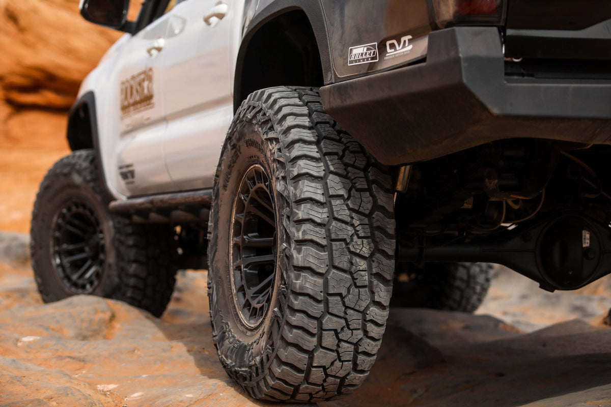 Mickey Thompson Baja Boss A/T — hero crawl closeup