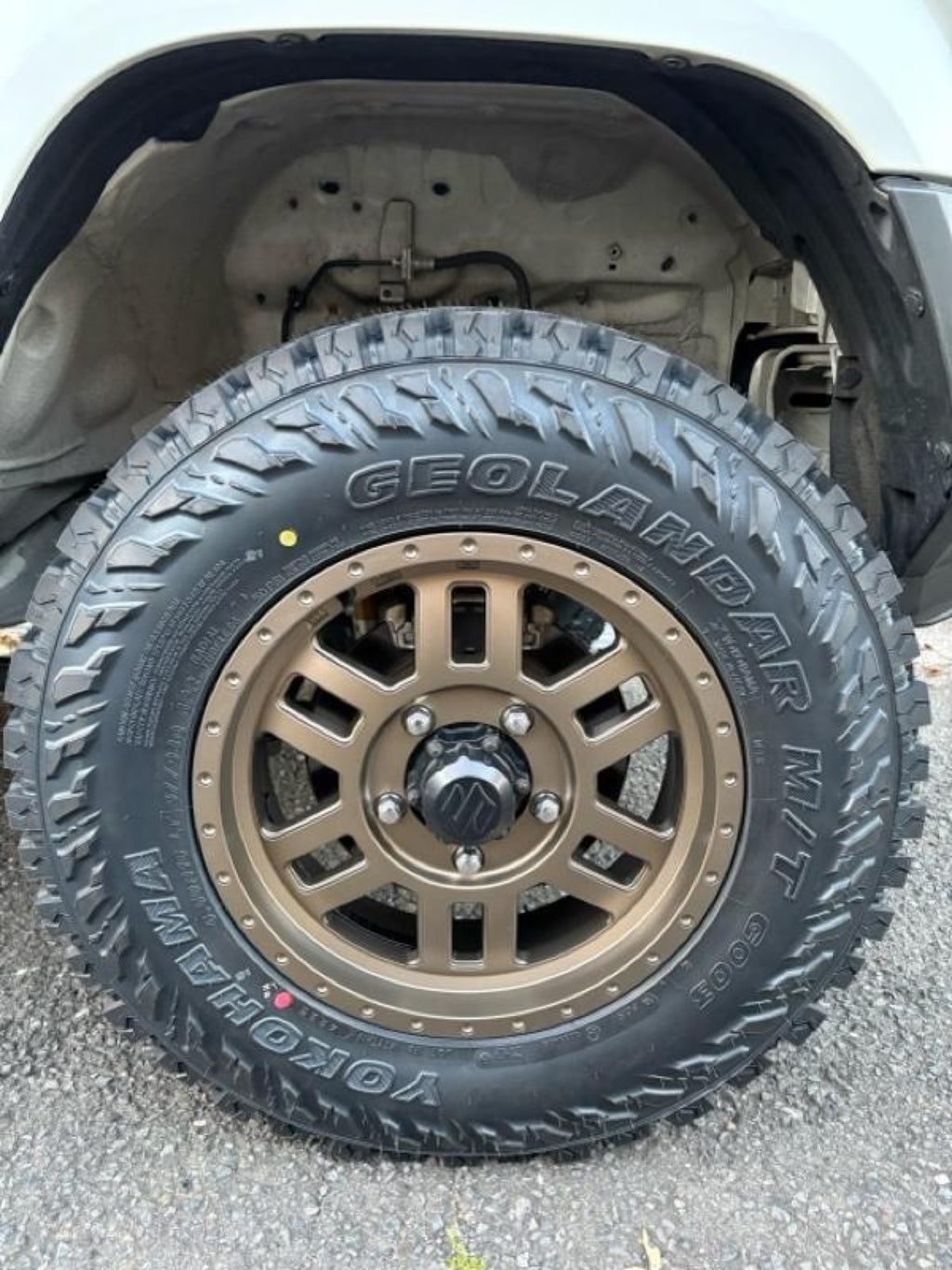 Yokohama Geolandar M/T G003 — ugc bronze wheel