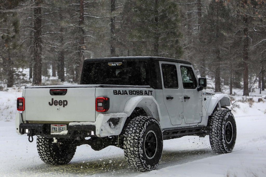 Mickey Thompson Baja Boss A/T — hero gladiator snow