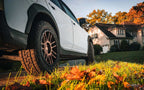 Nitto Nomad Grappler — hero mounted grass