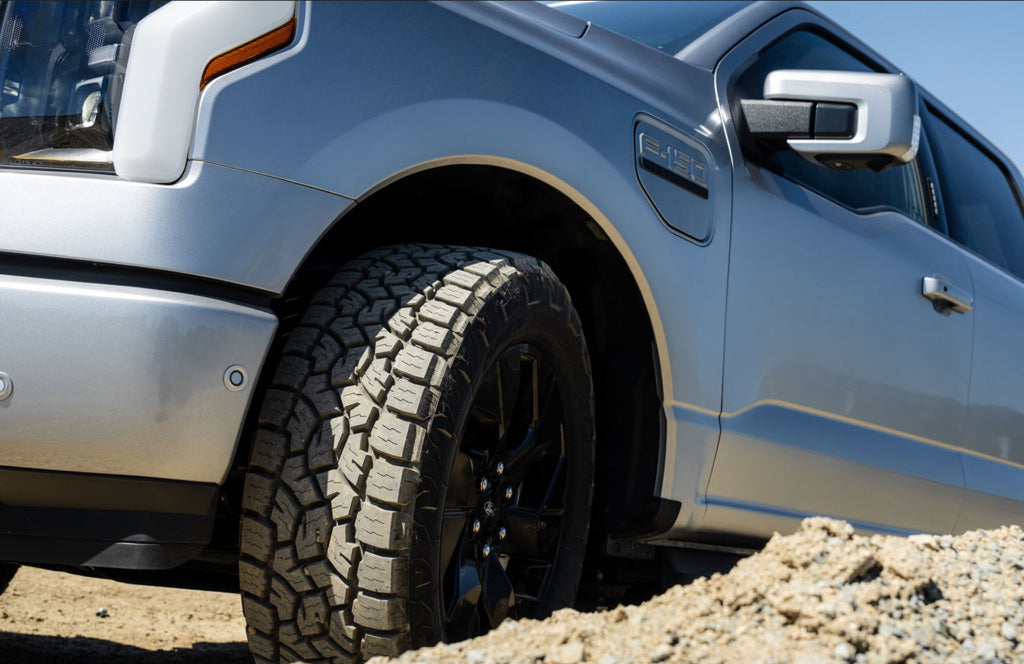 Toyo Open Country A/T III EV — mfr lightning wheel