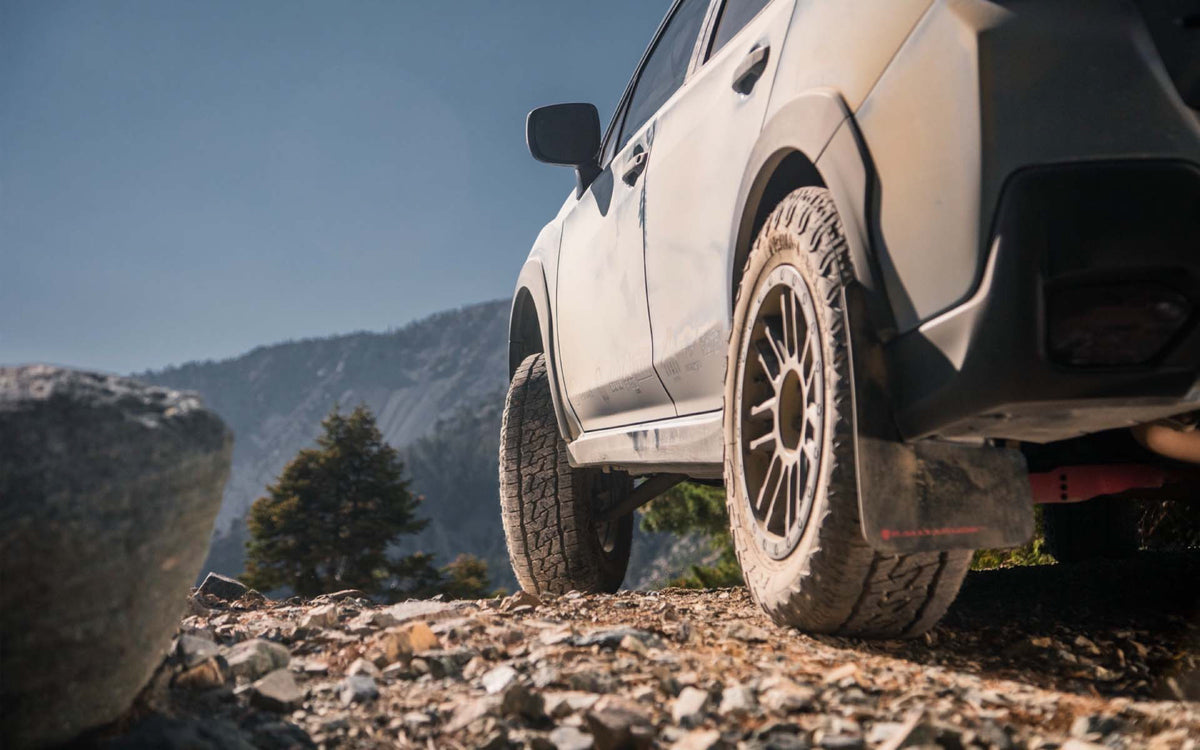 Nitto Nomad Grappler — hero mounted rocks