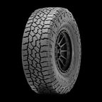 Falken Wildpeak A/T4W all-terrain tire, three-quarter view showing staggered shoulder blocks