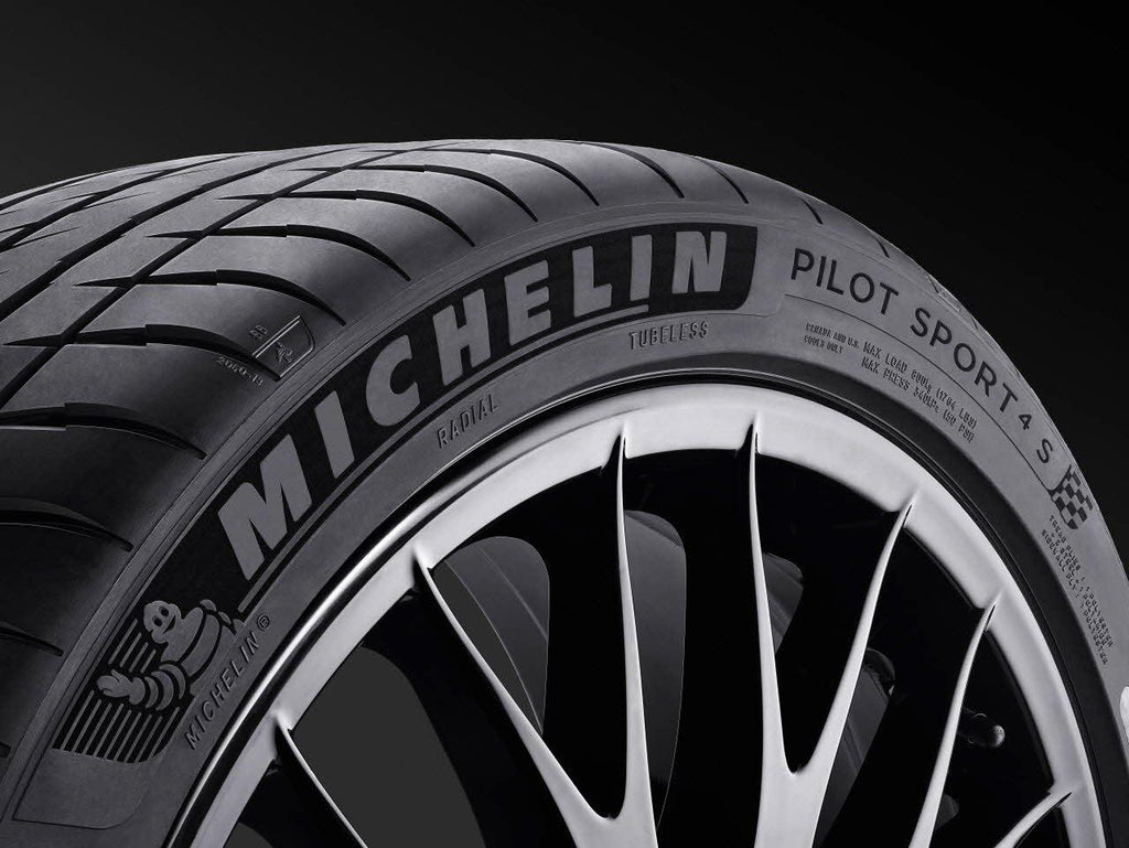 Michelin Pilot Sport 4S sidewall and tread close-up on a black background