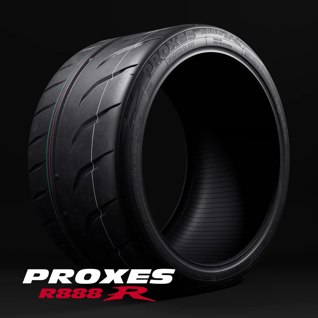 Toyo Proxes R888R DOT competition tire, studio product photo showing the directional tread and 265/35R19 93Y sidewall